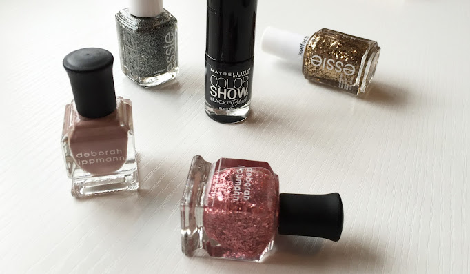 Glitter, pastels and stylish blacks for winter nails.