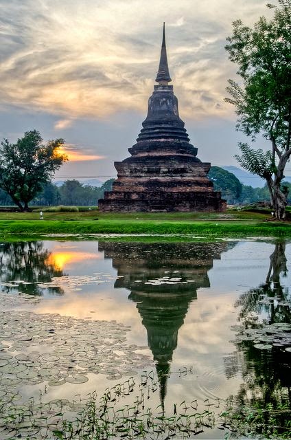 Chedi reflections in Sukhotai Historical Park / Thailand