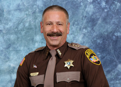 sheriff hatless mustache