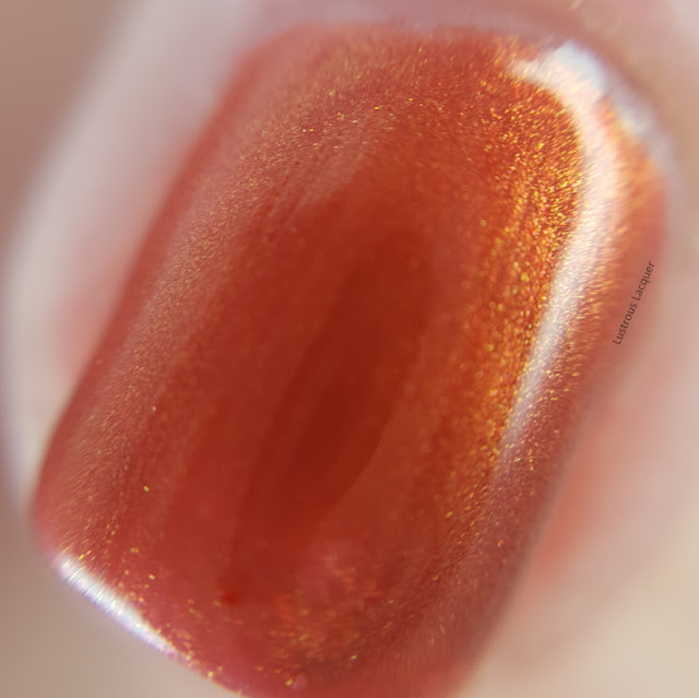 Rustic-copper-orange-nail-polish-with-golden-shimmer