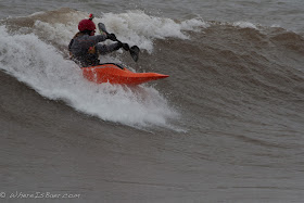 Scott Ewen showing off the North Shore break, stoney point, minnesota kayak surf, Chris baer,