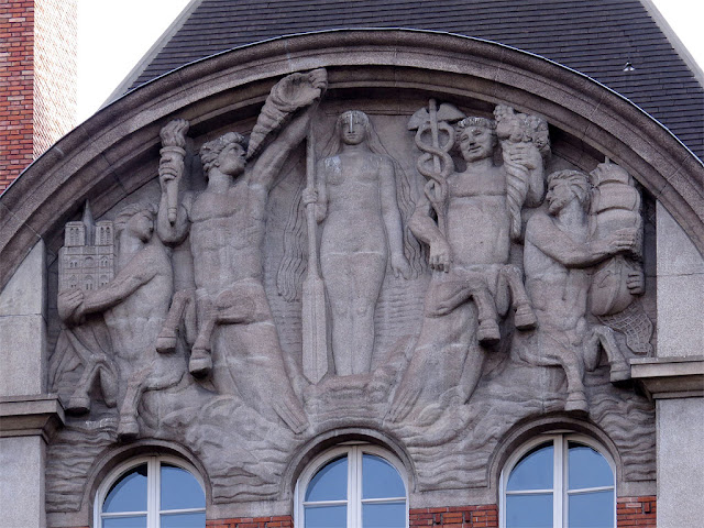 Bas-reliefs on the façade of a building, Quai de Conti, Paris