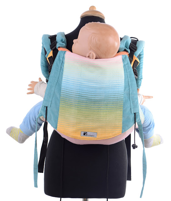Onbuhimo by Huckepack, made from the Girasol wrap Rainbow Dreamer, very adjustable panel, well padded shoulder straps