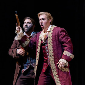 IN REVIEW: baritones ZACHARY NELSON as Leporello (left) and TIMOTHY MURRAY as Don Giovcanni (right) in North Carolina Opera's January 2023 production of Wolfgang Amadeus Mozart's DON GIOVANNI [Photograph by Eric Waters Photography, © by North Carolina Opera]