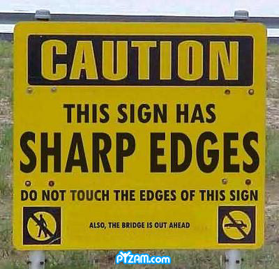 photo of a sign that reads...sharp edges in bold, then also bridge is out