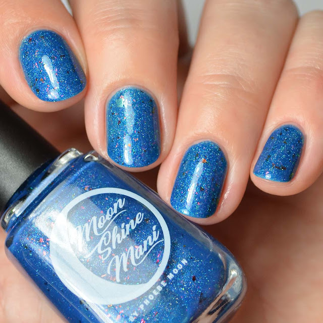 cerulean blue nail polish with color shifting flakies