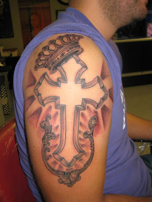 arm cross  tattoo