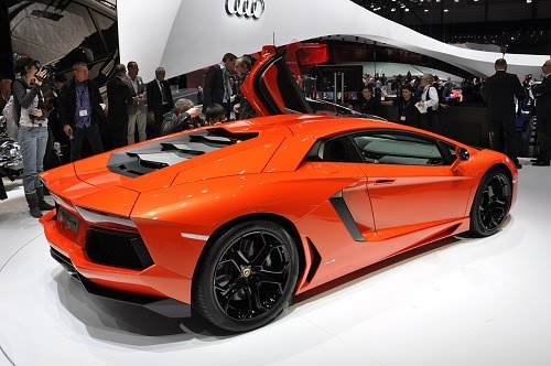 Lamborghini had three Aventadors on display ranging from the bright orange