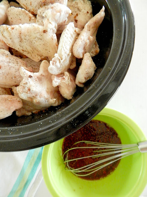 Slow Cooker Asian Chicken Wings...cooked on LOW in the slow cooker, then broiled to perfection right before eating.  A sweet, spicy sauce gives them a delicious glaze! (sweetandsavoryfood.com)