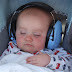 Cute Babies Wearing Headphone