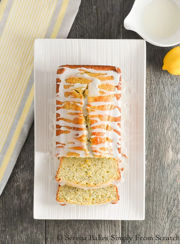 Moist Lemon Poppy Seed Bread recipe is a favorite loaf with a delicious light crumb, and lemon glaze. Perfect for breakfast, afternoon tea or dessert from Serena Bakes Simply From Scratch.