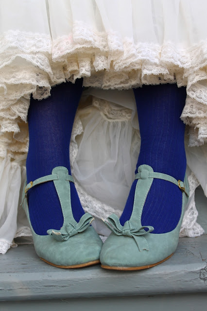 vintage petticoat with blue stocking socks and blue t strap shoes with bow