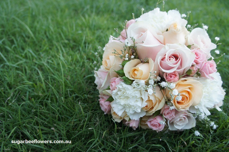 Pale pink peach and white wedding bouquet