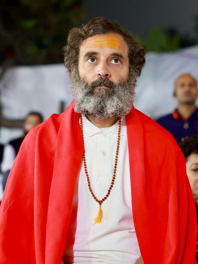 Rahul Gandhi in red shawl in temple