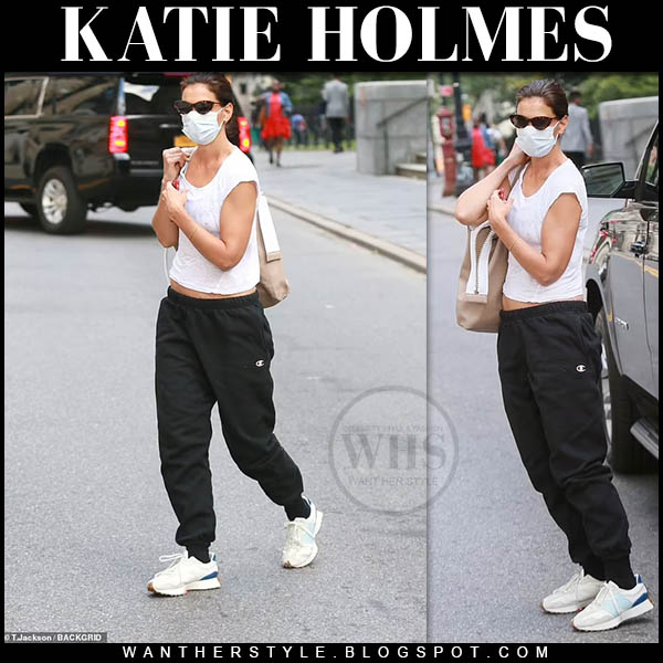 Katie Holmes in white top, black sweatpants and sneakers