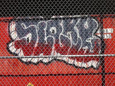 A shipping container under the Ballard Bridge