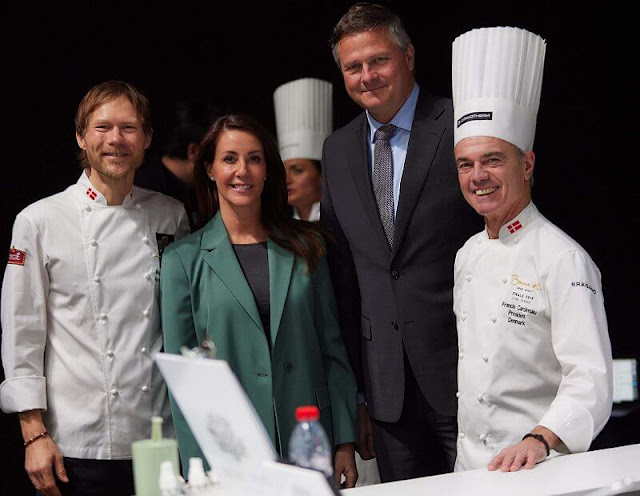 Princess Marie wore a new green blazer, suit, by Maje, and green tailored trousers by Maje Paris. Danish chef Brian Mark Hansen