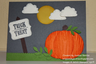 Punch art Halloween card with pumpkin, moon, clouds and "trick or treat" sign.