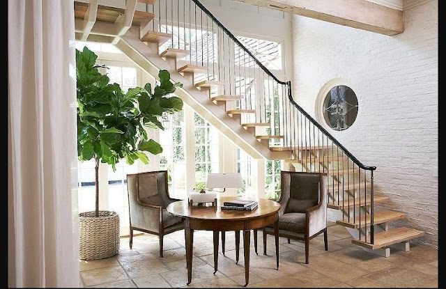 staircase ideas living room with round table and window
