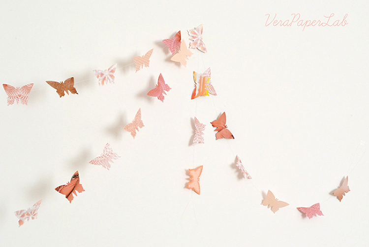 https://www.etsy.com/listing/101734427/peach-and-antique-pink-paper-butterflies?ref=shop_home_feat_1