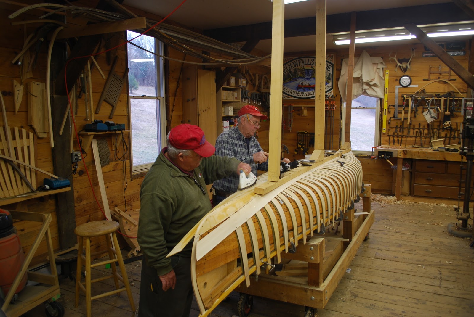 Here are Walter and Steve working together on planking the Smoothwater 
