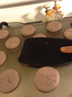 Push down on the soft baked shortbread cookie with a spatula