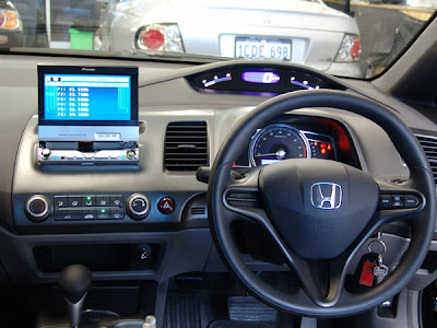  a wellrounded car Inside this Civic has a dramaticlooking interior 