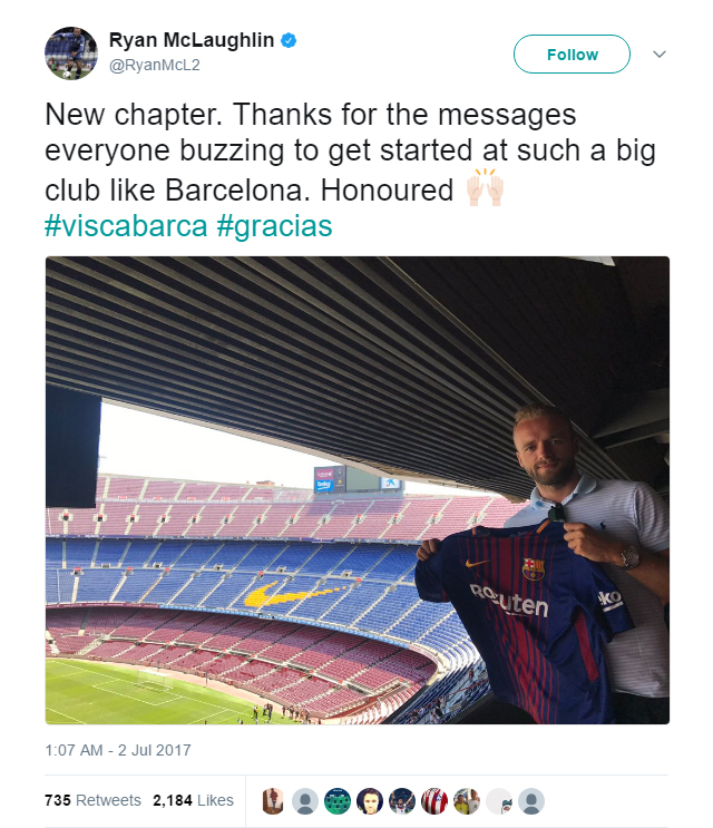 Ryan McLaughlin poses with a Barcelona shirt inside the Camp Nou