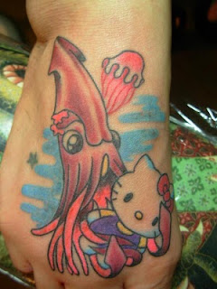 Hello Kitty squid tattoo on foot