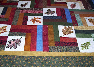 The borders for this leaf quilt will be gold and green.