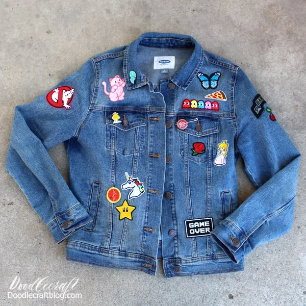 Upcycled Jean Jacket with Patches: Earth Day Craft!  Hi friends, it's me, Natalie! I love upcycled crafts. They are my favorite medium for sure. I love taking old things and giving them new life. April is the perfect month for upcycling and celebrating Earth Day! Make a fabulous statement piece by upcycling an old jean jacket with patches.   This NO-SEW jean jacket upcycle is a perfect craft for all ages and genders! Upcycle a backpack, jeans, tote, pillowcase or anything else too.