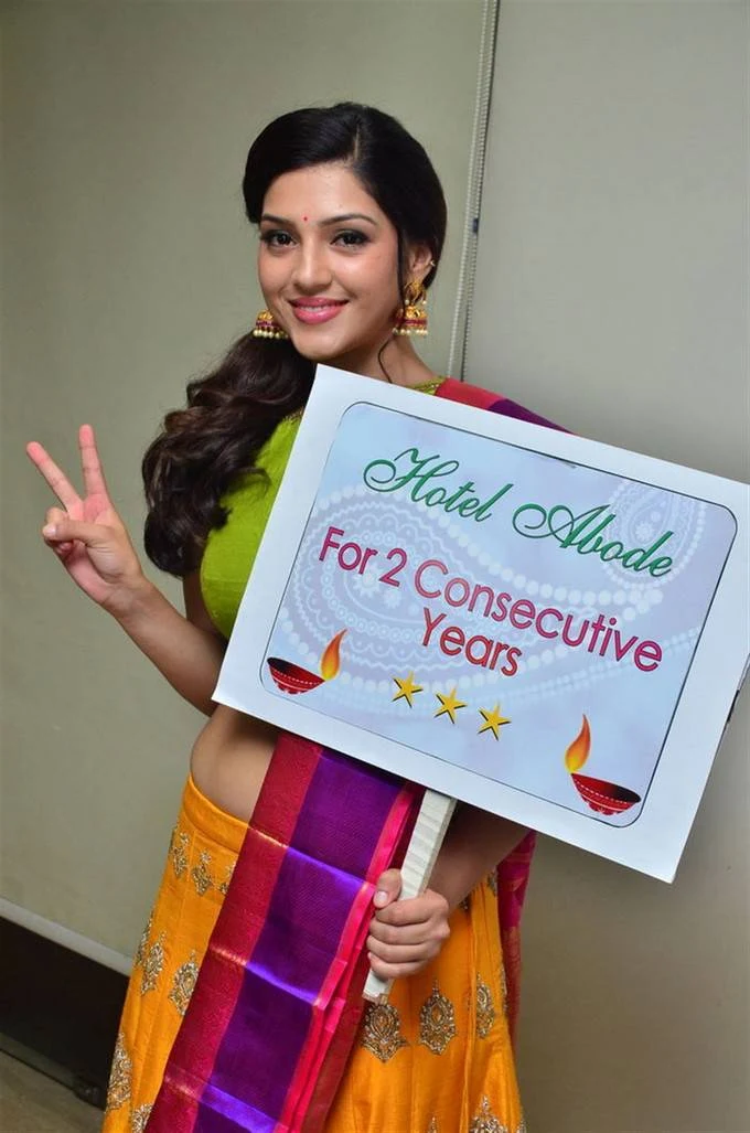 Mehreen Kaur Stills In Designer Yellow Lehenga Green Choli