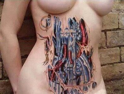 Cool Tattoo Designs on Biomechanical Tattoo On The Abdomen