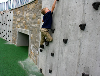 Climbing a rock wall.