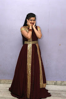 Akshitha Beautiful Photos In Maroon Color Long Dress