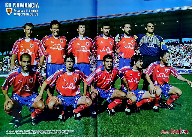 C. D. NUMANCIA. Temporada 1998-99. Palacios, Cortijo, Barbarín, Javi Moreno, Ángel y Diezma. Quique Medina, Iñaki, Octavio, Caco Morán y Castaño. C. D. NUMANCIA 3 REAL CLUB RECREATIVO DE HUELVA 0 Domingo 20/06/1999. Campeonato de Liga de 2ª División, jornada 42. Soria, estadio de Los Pajaritos: 8.500 espectadores. GOLES: 1-0: 3’, Javi Moreno. 2-0: 85’, Ángel Luis. 3-0: 89’, Artigas, de penalti