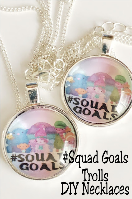 Make your own awesome Party favors for your next Trolls party with the help of this DIY #SquadGoals Trolls party favor necklaces and free printable. You'll have the most amazing party favors that guests will love for the most awesome party ever. #squadgoals #trollsparty #trolls #oneinchcircle #diypartymomblog