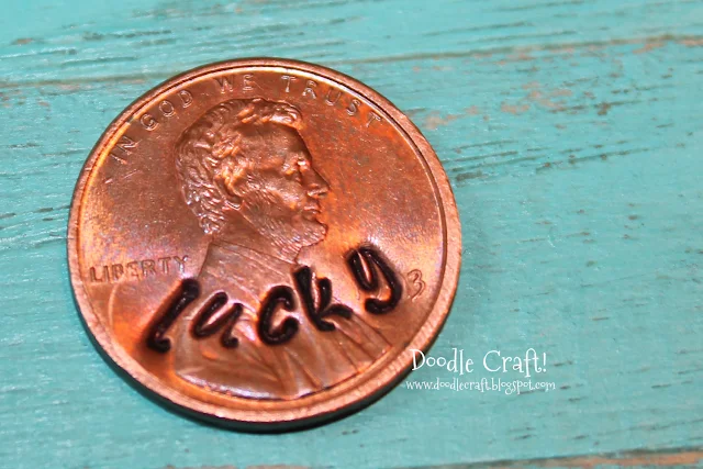 http://www.doodlecraftblog.com/2013/07/lucky-stamped-pennies.html