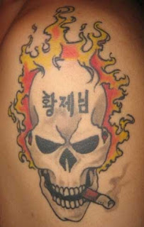 Skull Tattoo Design  Combination With Flame and  Cigarette Tattoo