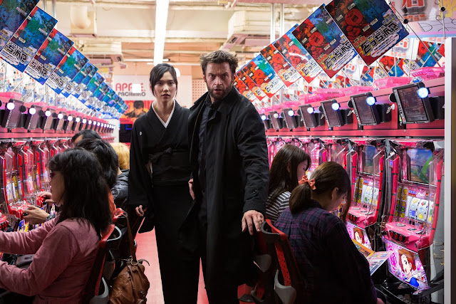 The Wolverine Logan & Mariko in Japan in an arcade