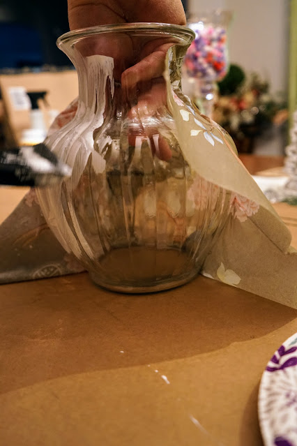 Applying decoupage to a vase