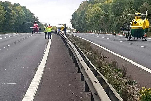 Four Air Ambulance helicopters landed on the motorway