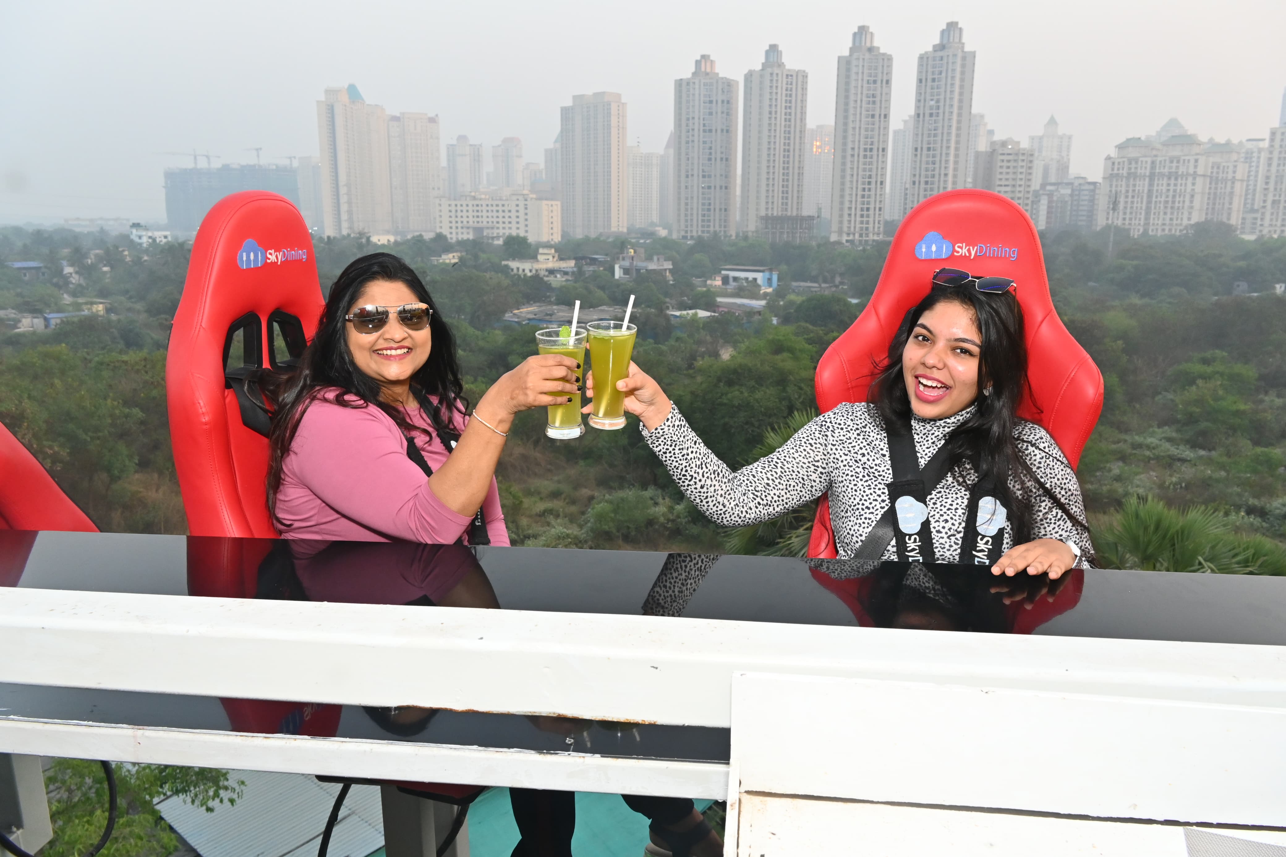 "Dining Above the Clouds: Influencers' Rave Reviews of Sky Dining Mumbai's Culinary Soar. Fully sold out for New Year's Celebrations"