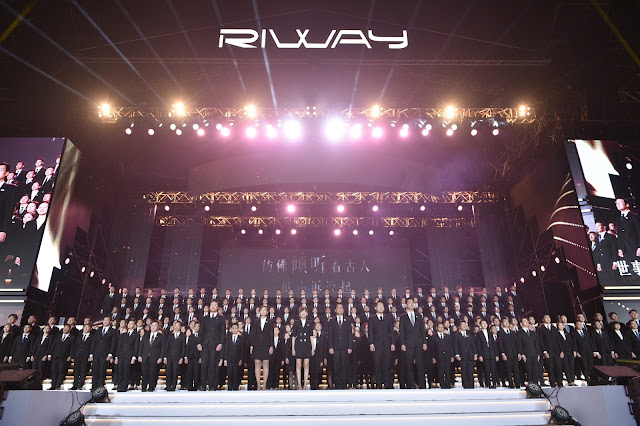 Close-Up View of Riway Staff on the Event Stage
