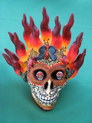 Flaming skull contains details within details Notice that the eyes of the