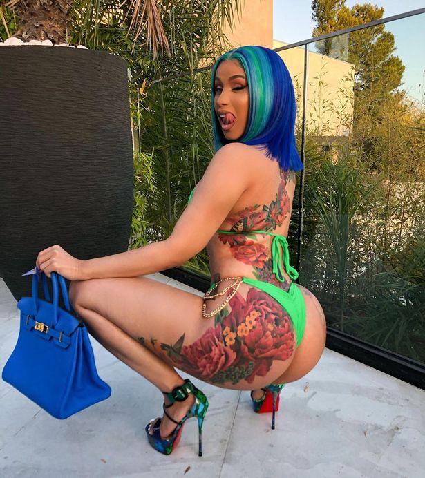 Cardi B Tensions Instagram As She Release Sensual Photos Displaying Her Full Body Floral Tattoo.