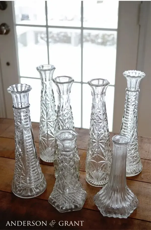 Collection of clear glass bud vases