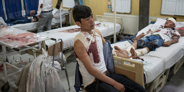 Hospitals treated the many Afghans wounded Saturday when suicide bombers struck a demonstration in Kabul, the capital.