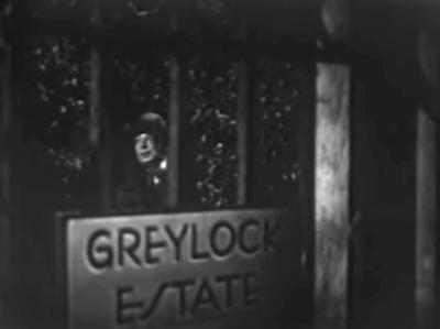 A sign on a gate reads GREYLOCK ESTATE