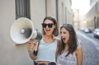 woman-screaming-in-loudspeaker